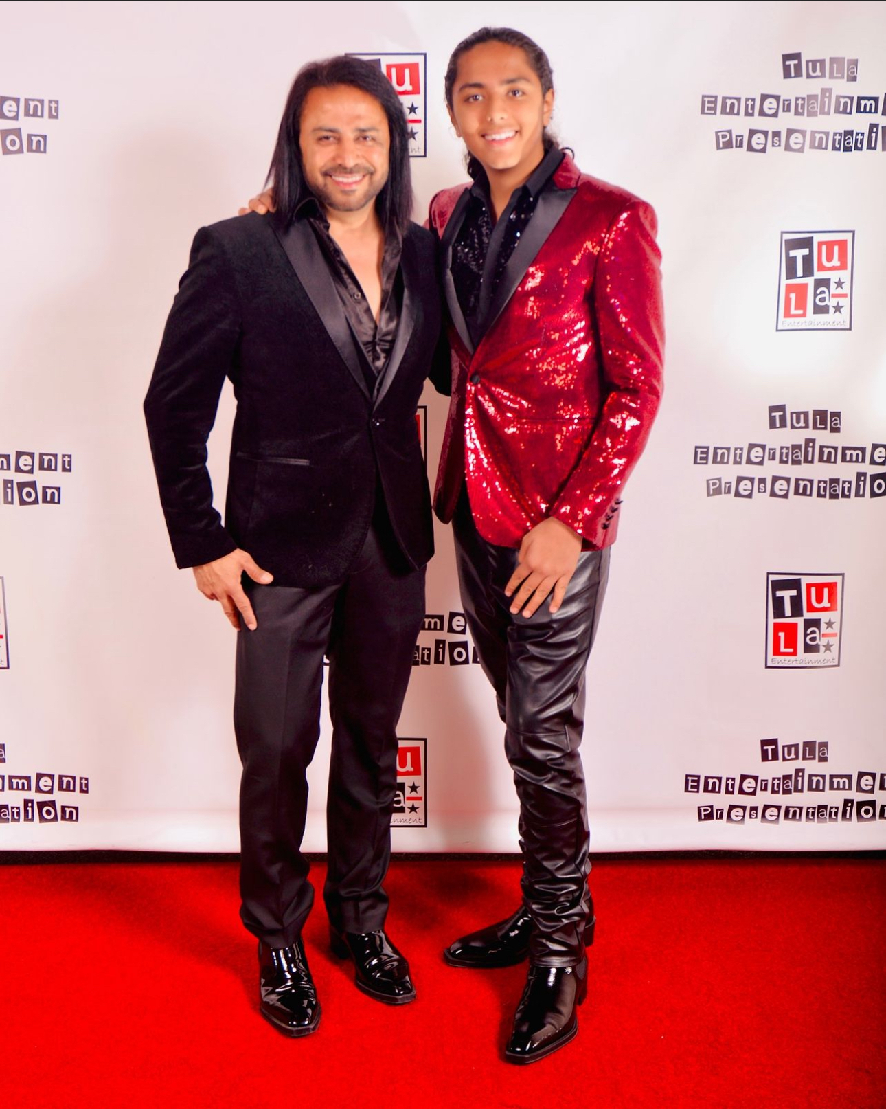 Aryan Rohira and his father Sanjay Rohira smiling on the red carpet